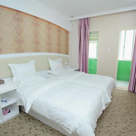 Xinghe Xinfeng Hotel Guangzhou Værelse billede