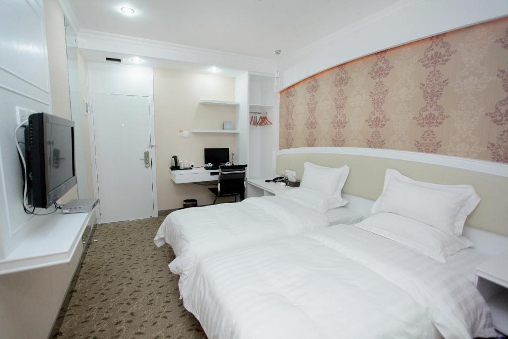 Xinghe Xinfeng Hotel Guangzhou Værelse billede